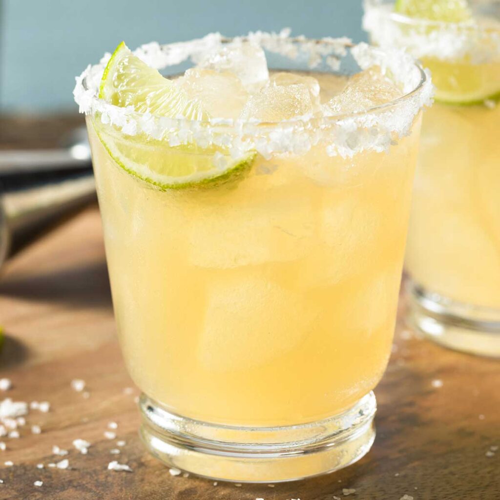 skinny {title:2:3} in a glass with a slated rim and a lime wedge